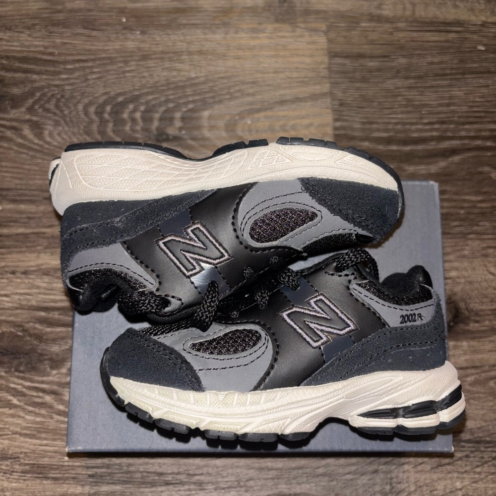 New Balance Kids Black and White Sneakers